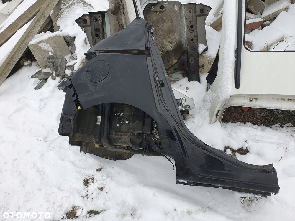 błotnik prawy tył Opel Corsa E - 1