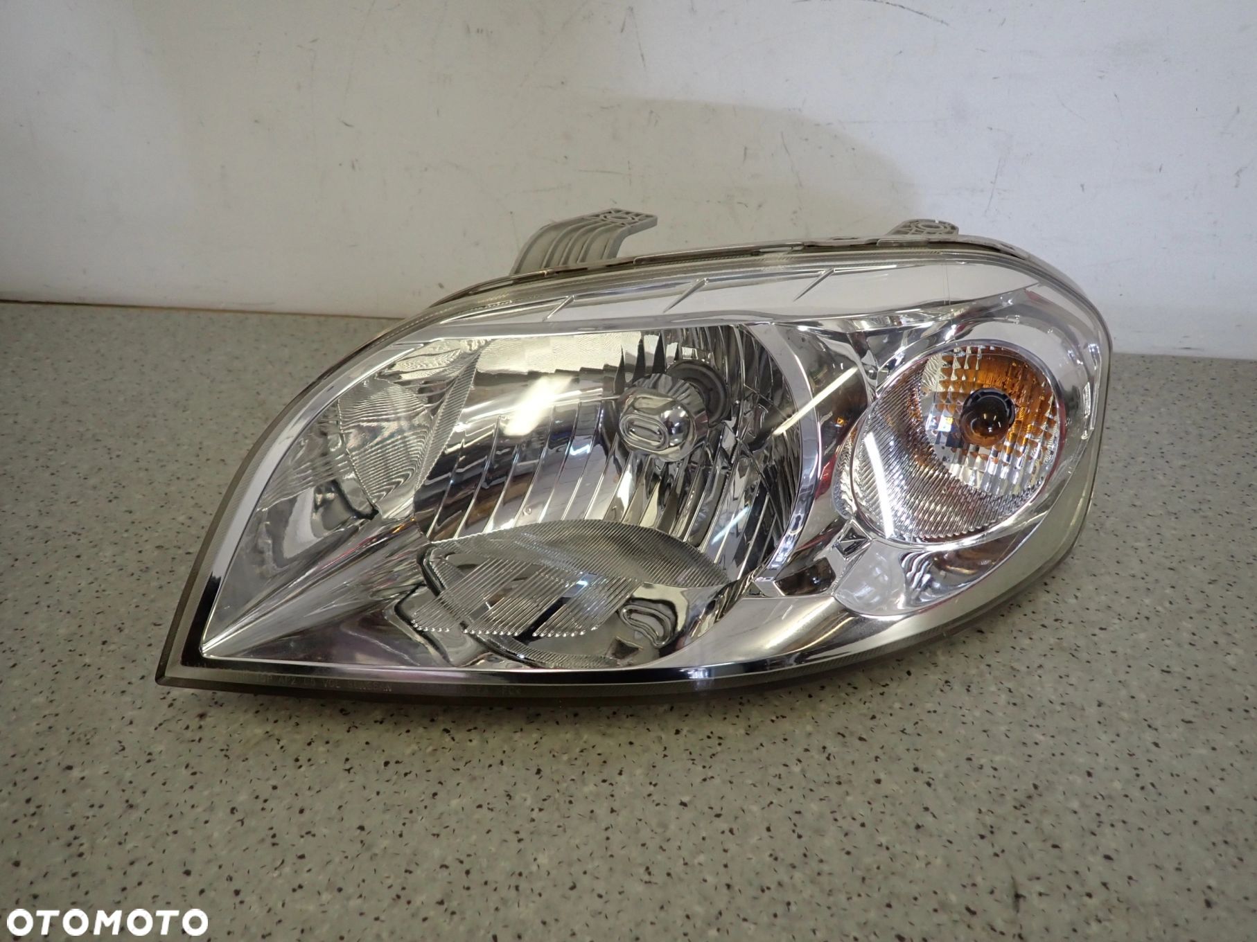 CHEVROLET AVEO T250 SEDAN 4D 07- REFLEKTOR LAMPA PRZEDNIA LEWA - 1