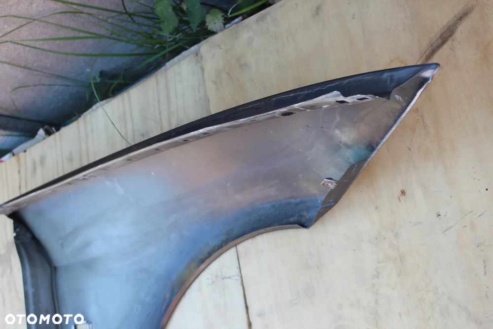 BŁOTNIK LEWY PRZEDNI BMW E90 E91 2007 - 17