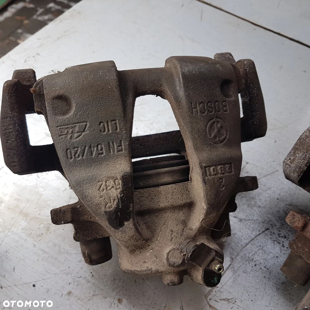 zacisk zaciski jarzmo 126 seicento cc sporting panda polonez pod tarcze duże wentylowane zwykłe 257mm 240mm - 25