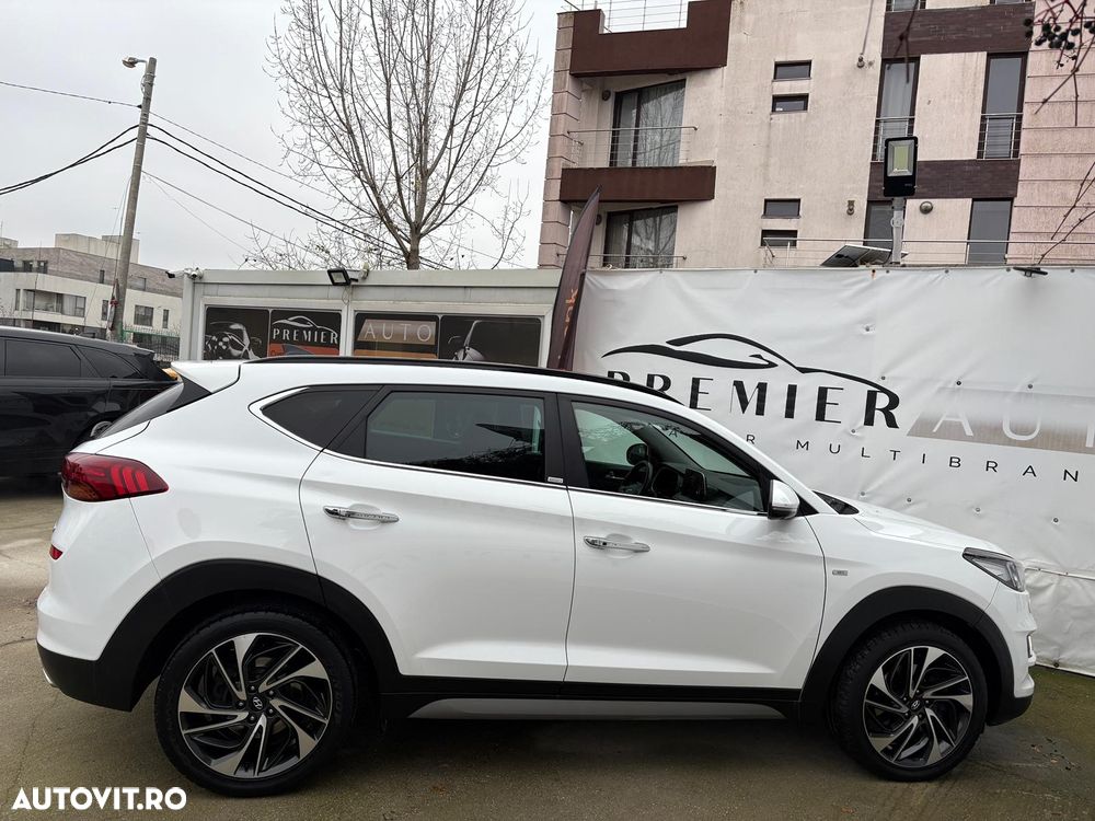 Hyundai Tucson 2.0 CRDI 4WD 6AT Luxury+ - 11