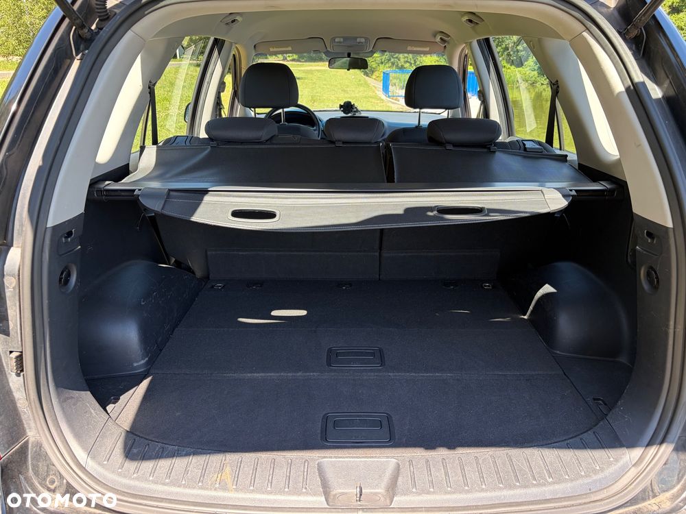 Kia Carens 2.0 CVVT EX Top - 23