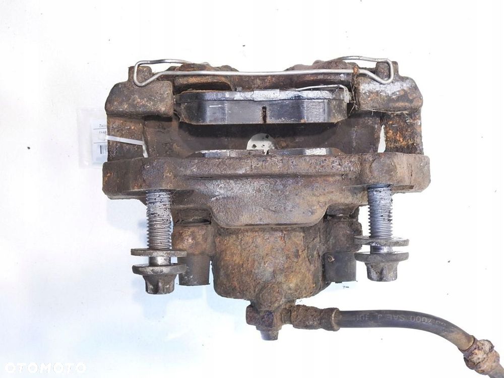 ZACISK HAMULCOWY LEWY PRZÓD SAAB 9-5 - 5