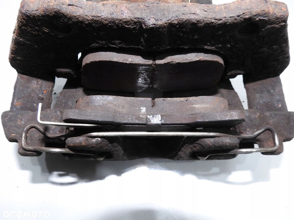 ZACISK HAMULCOWY LEWY PRZÓD OPEL MERIVA A - 4