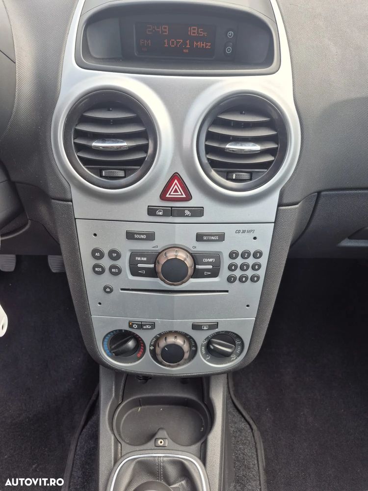 Opel Corsa 1.2i Cosmo - 9