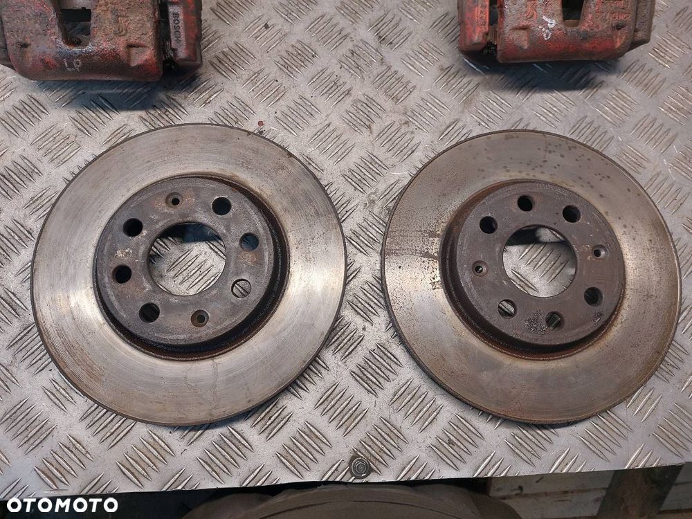 TARCZE HAMULCOWE TYŁ + KLOCKI + ZACISKI FIAT GRANDE PUNTO I 1.4 8V - 2