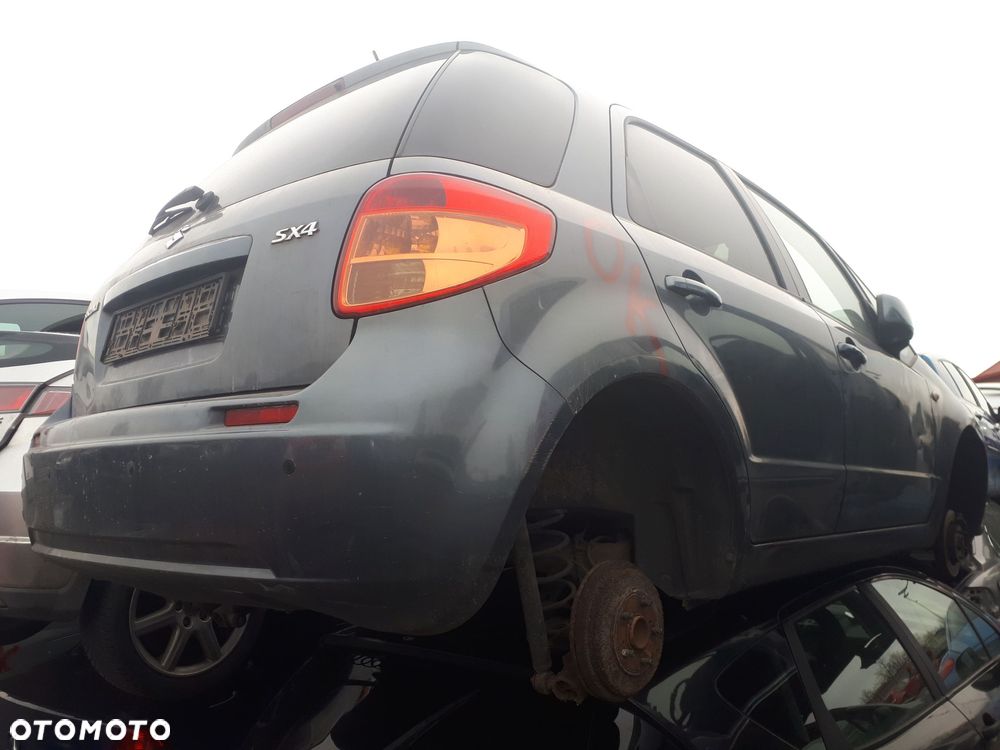 SUZUKI SX4 06-09 1.6 16V OSŁONA PRZECIWSŁONECZNA PRAWA LEWA - 11