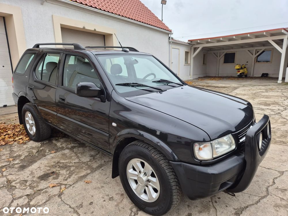 Opel Frontera 3.2 LTD - 13