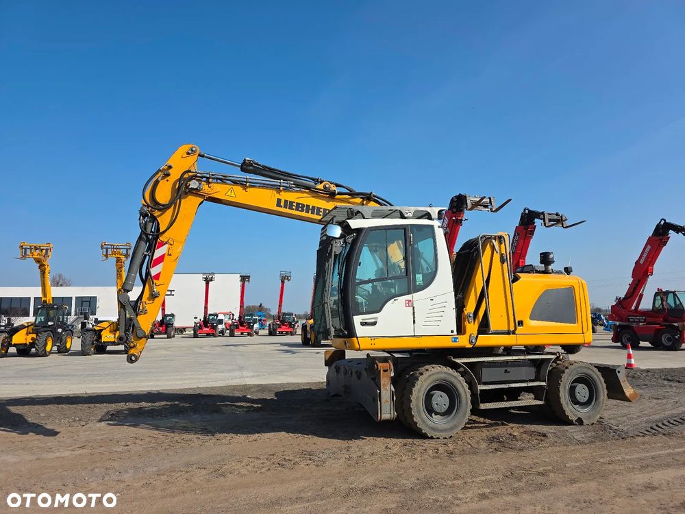 Liebherr A 914 Litronic jak TEREX CAT SENNEBOGEN M497 - 6