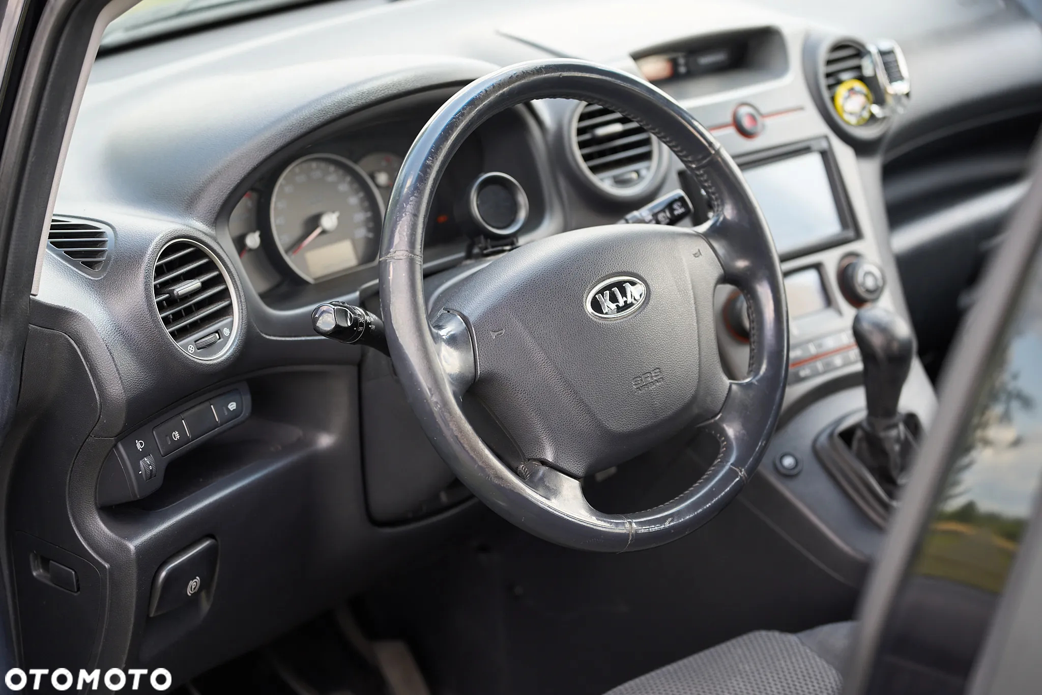Kia Carens - 15