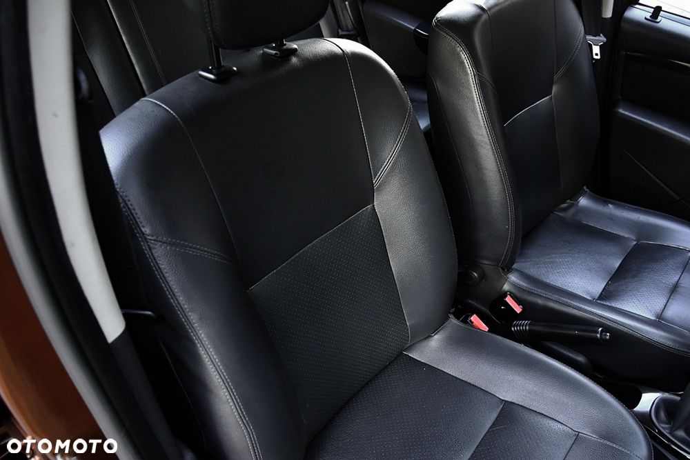Dacia Duster 1.6 16V 4x2 Prestige - 23