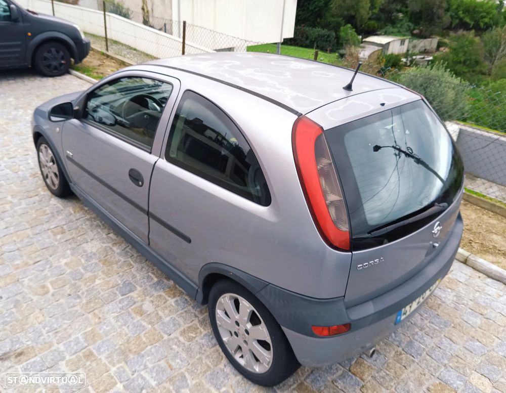 Opel Corsa 1.2 16V Enjoy - 8