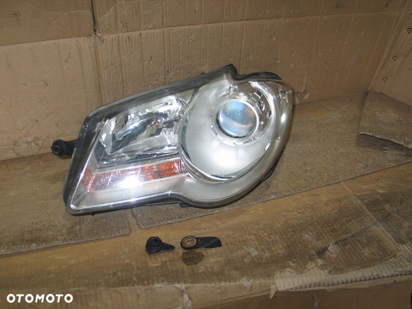 lampa przod vw touran 1 lift 06-10r. 1T1941005B europa