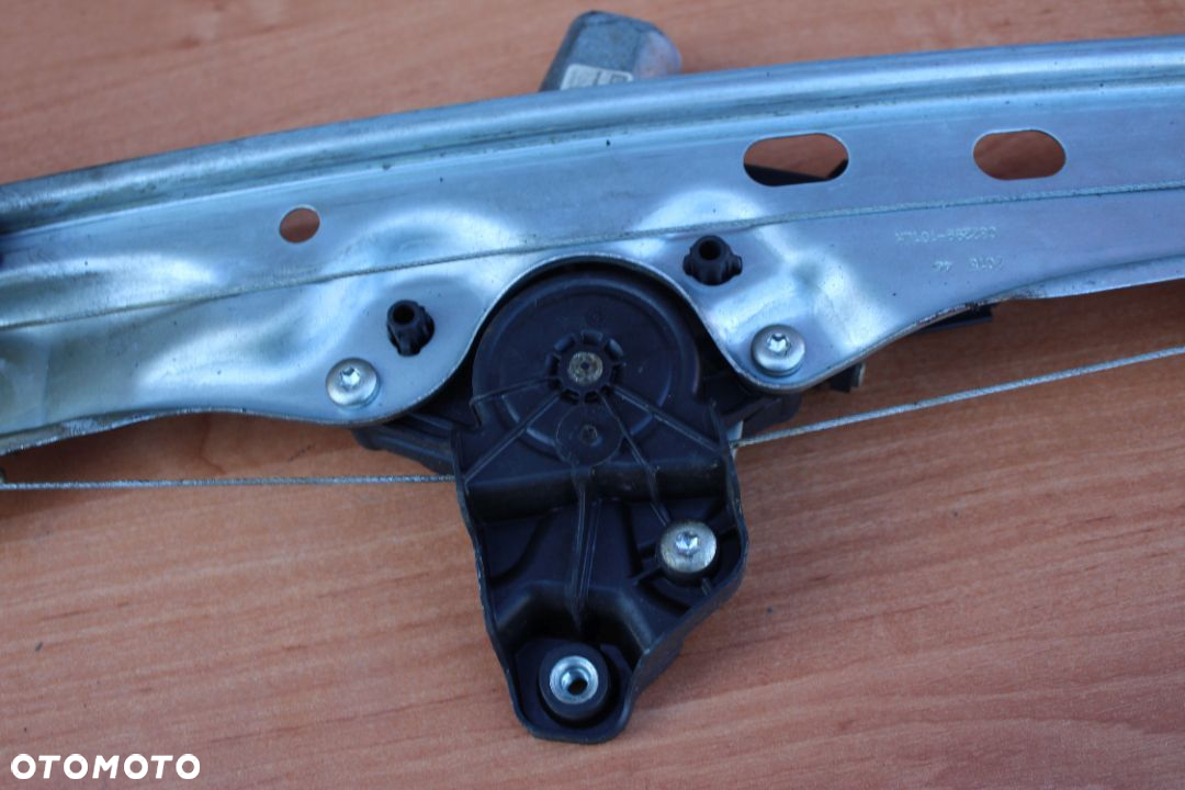 PODNOŚNIK MECHANIZM PODNOSZENIA SZYBY ELEKTRYCZNY LEWY TYŁ OPEL ASTRA K 13406677 - 7