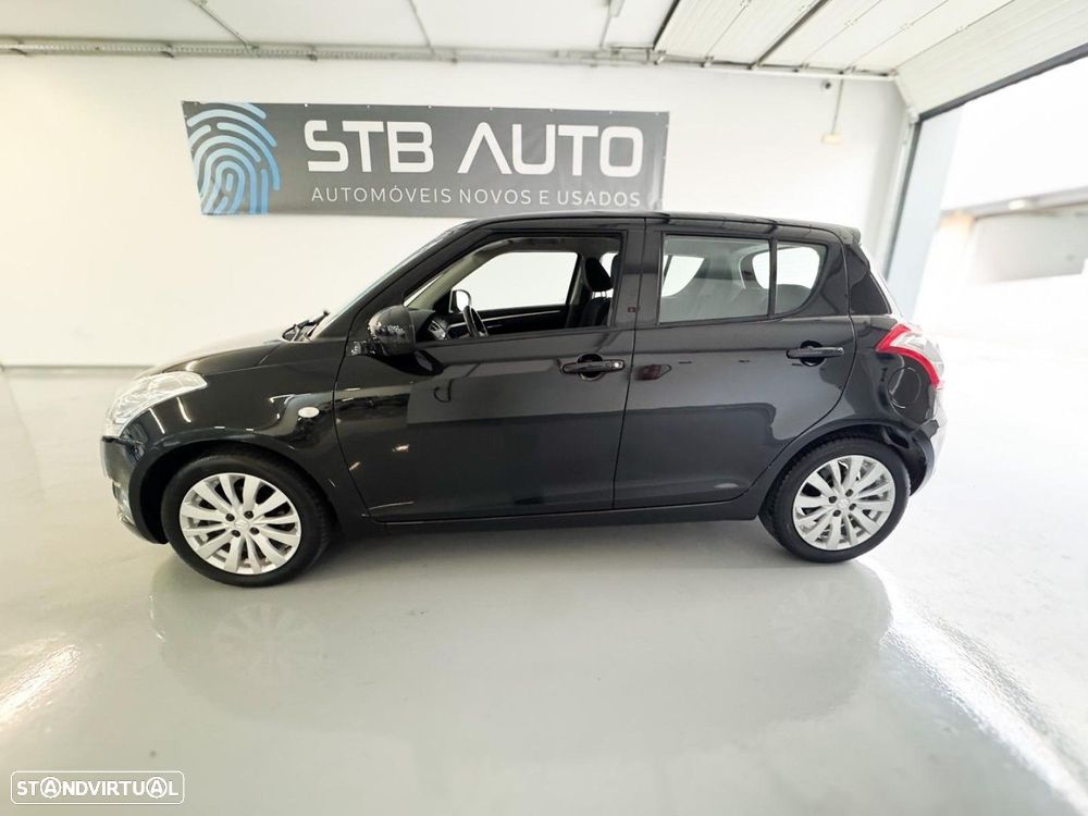 Suzuki Swift 1.2 VVT GLX - 12