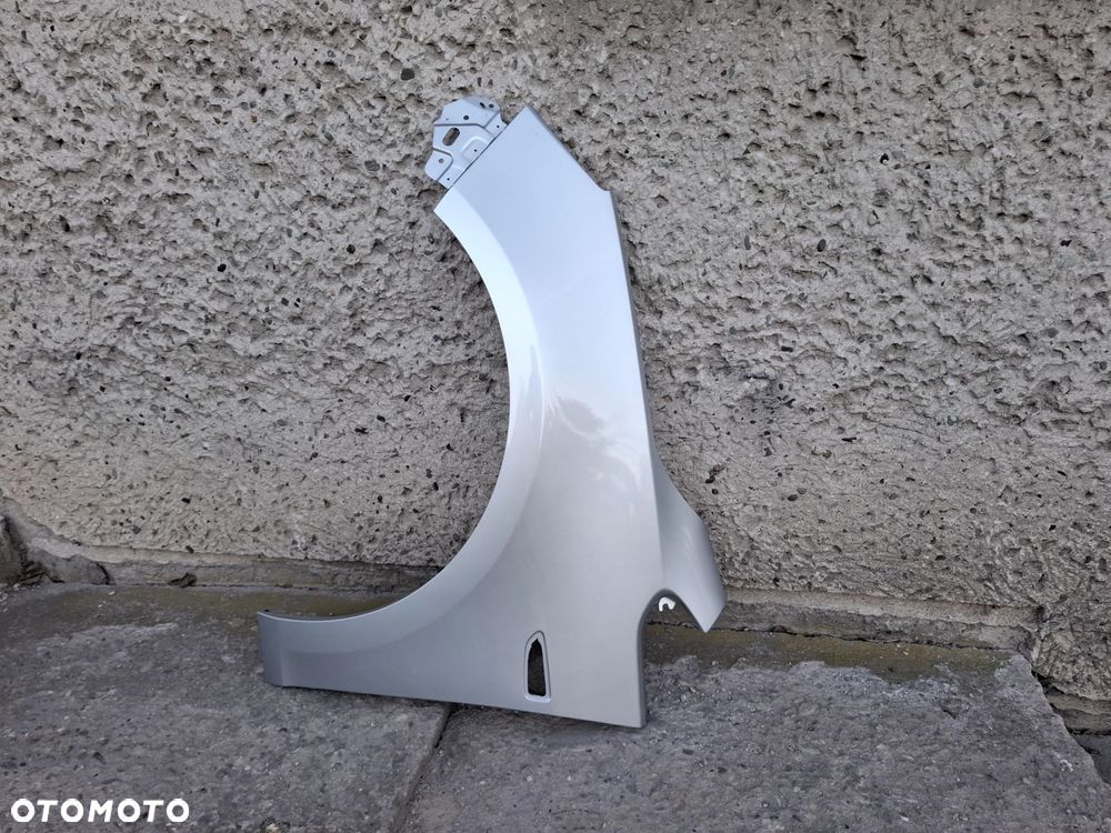 BŁOTNIK PRZEDNI LEWY OPEL ASTRA J IV Z176 - 2