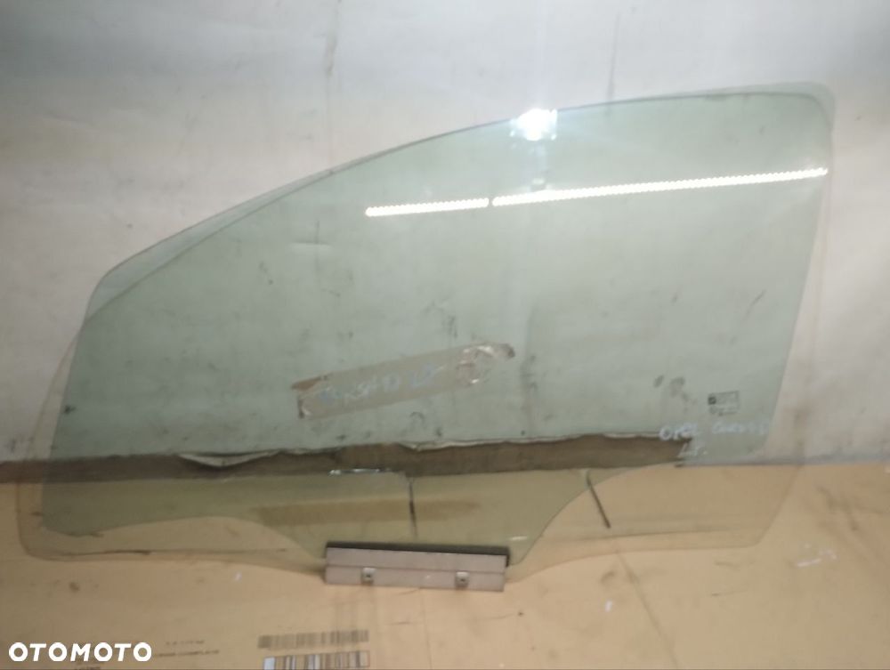 SZYBA BOCZNA LEWA PRZEDNIA DRZWI OPEL CORSA D 1.0 - 1