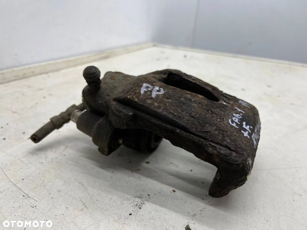 Zacisk hamulcowy VW Golf IV V VI Polo III IV Audi A3 8l 8p Leon I II Ibiza III IV Fabia I II III Octavia I II Caddy III 97-12r. prawy przedni jarzmo - 25