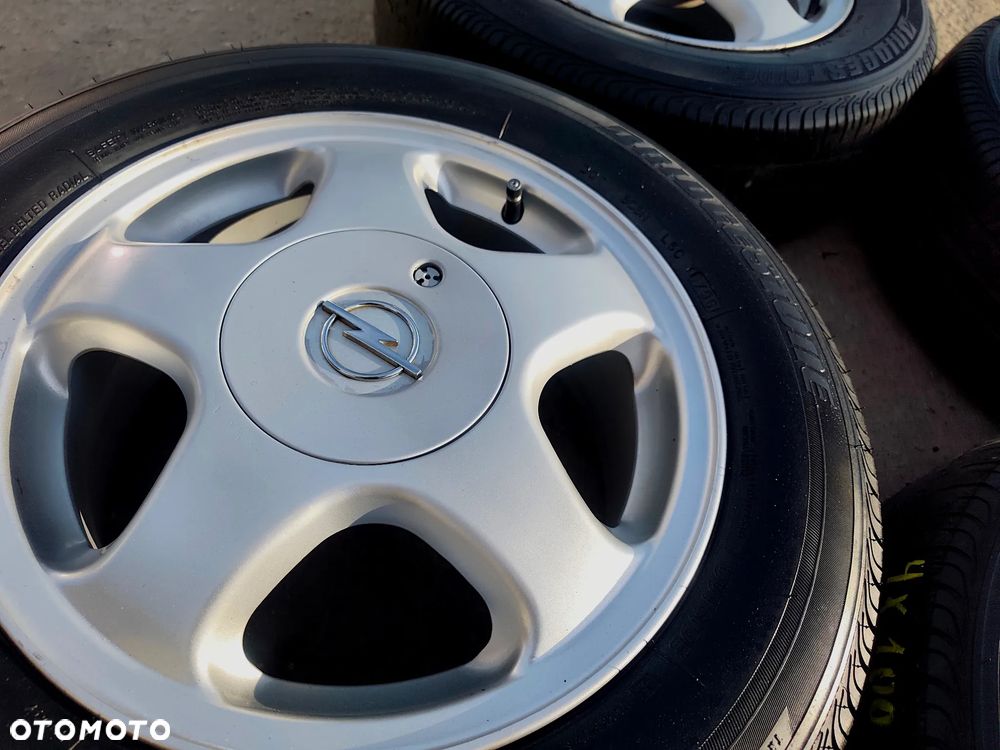 4x100 Felgi Aluminiowe Alufelgi Oryginalne 15 Koła Letnie Lato OPEL ASTRA G H CALIBRA COMBO C CORSA B C D VECTRA A B TIGRA KARL KADETT 4mm Legnica ALU-RAD 195/65 - 10