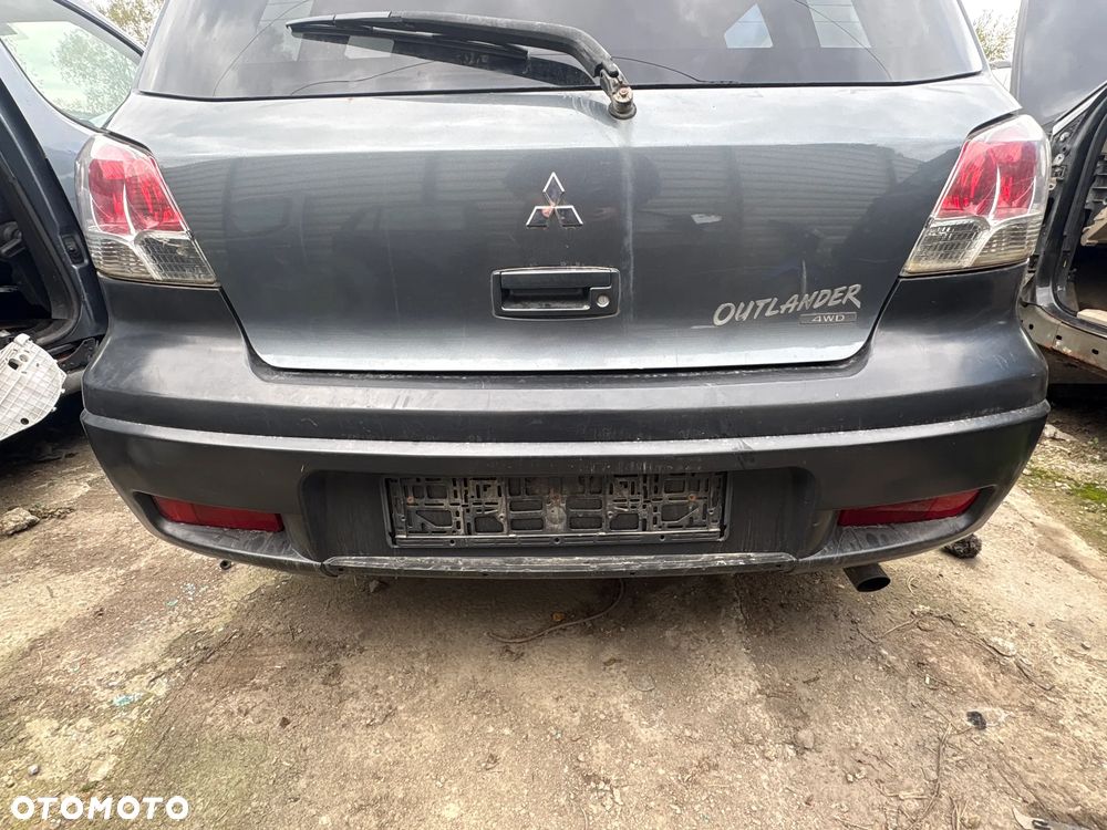 ZDERZAK TYLNY MITSUBISHI OUTLANDER 2003R - 1