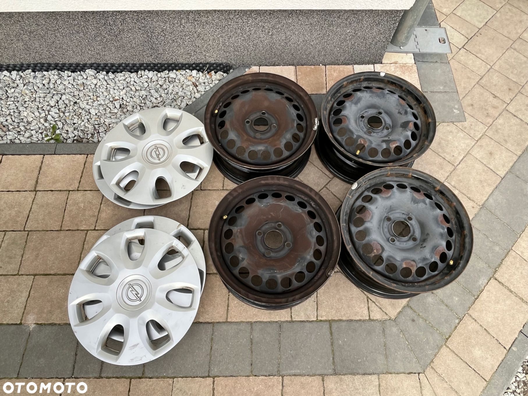 Opel Corsa D felgi 15 kołpaki - 1