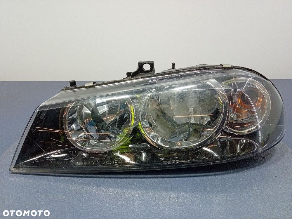 ALFA ROMEO 156 LIFT 03-06 REFLEKTOR LEWY LAMPA H7 EU 667-1111L - 1