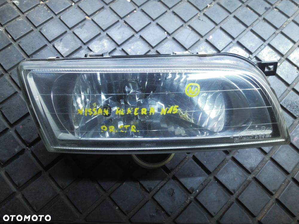 NISSAN ALMERA N15 REFLEKTOR LAMPA PRAWY PRZÓD - 1