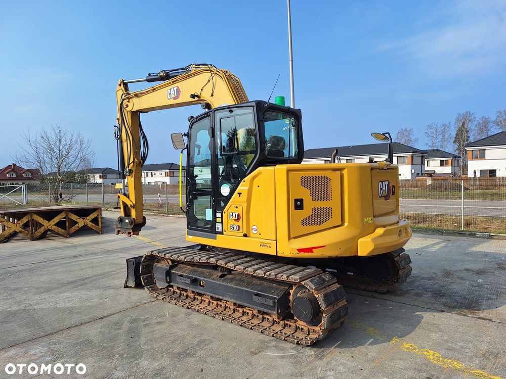 Caterpillar 310 - 1