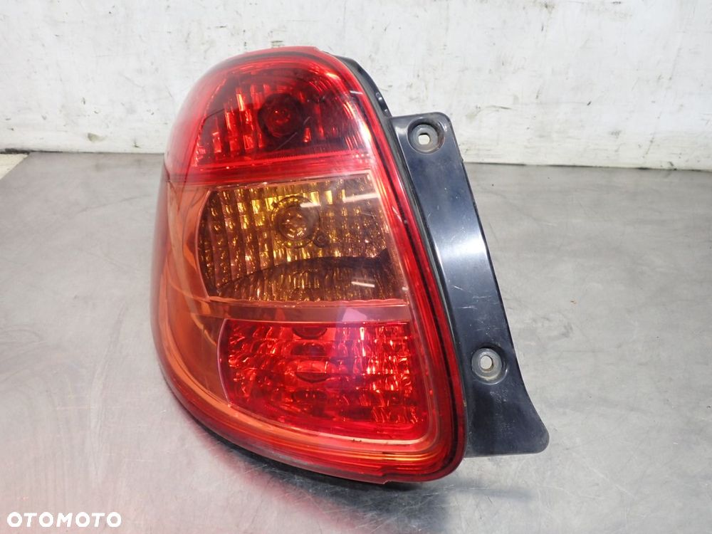 LAMPA LEWA TYLNA SUZUKI SX4 1.6 - 1