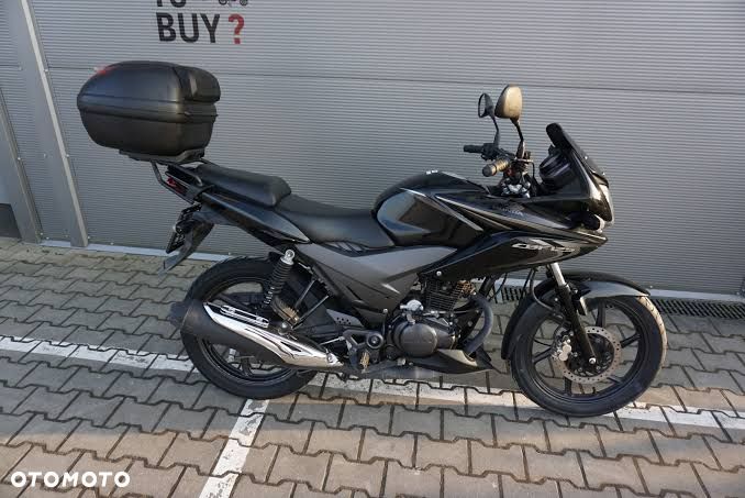 HONDA CBF 125 reflektor lampa czasza owiewka wypełnienie licznik błotnik kierownica lusterko manetka felga tarcza zacisk pompa zawieszenie silnik moduł regulator zbiornik siedzenie set podnóżek stelaż stopka chłodnica tłumik - 1