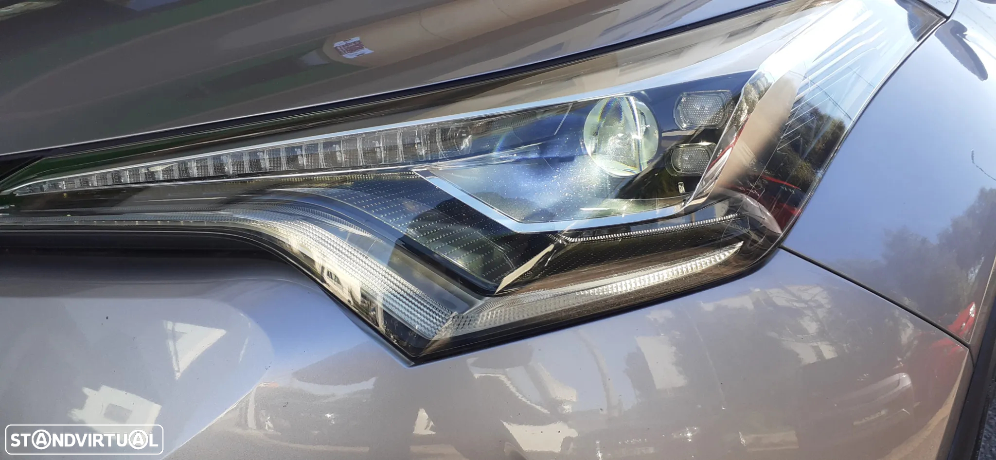 Toyota C-HR 1.8 HSD Exclusive+P.Luxury - 28