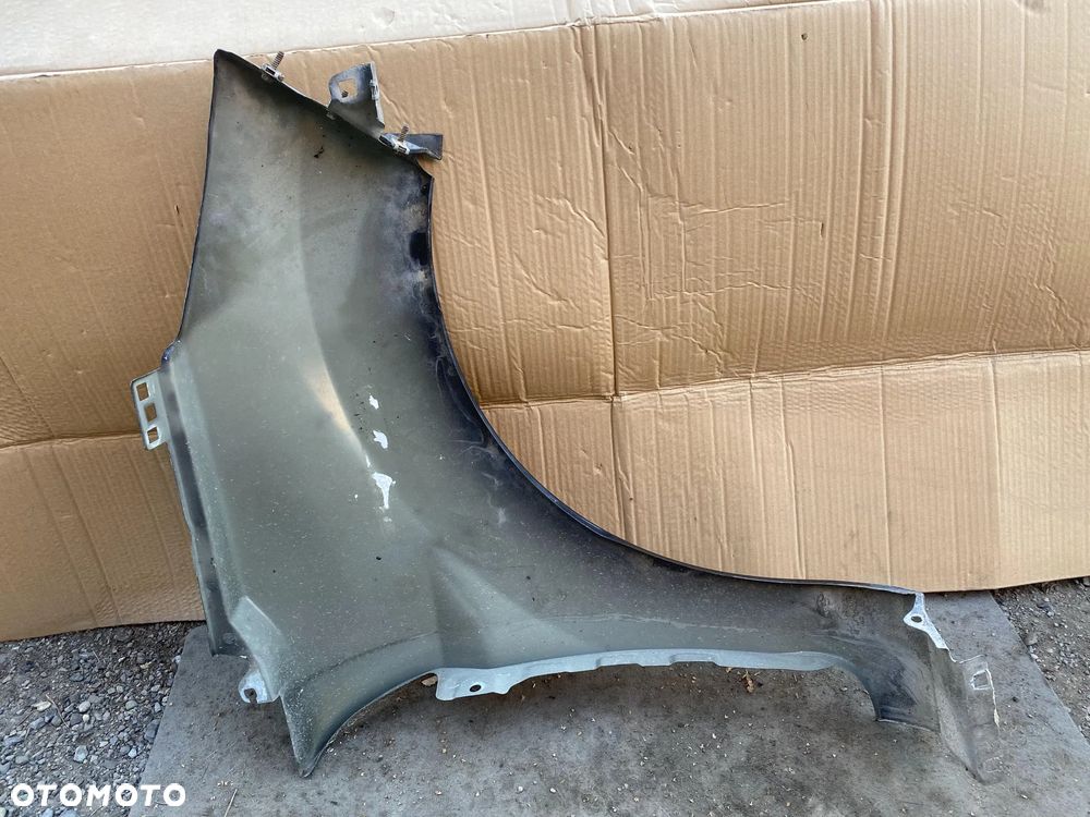 Błotnik Ford Fiesta MK7 lewy OE - 4