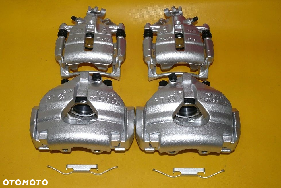 ZACISKI JARZMA LEWY PRAWY PRZÓD TYŁ VW TRANSPORTER T5 308/29,5 294/22mm 03- - 2