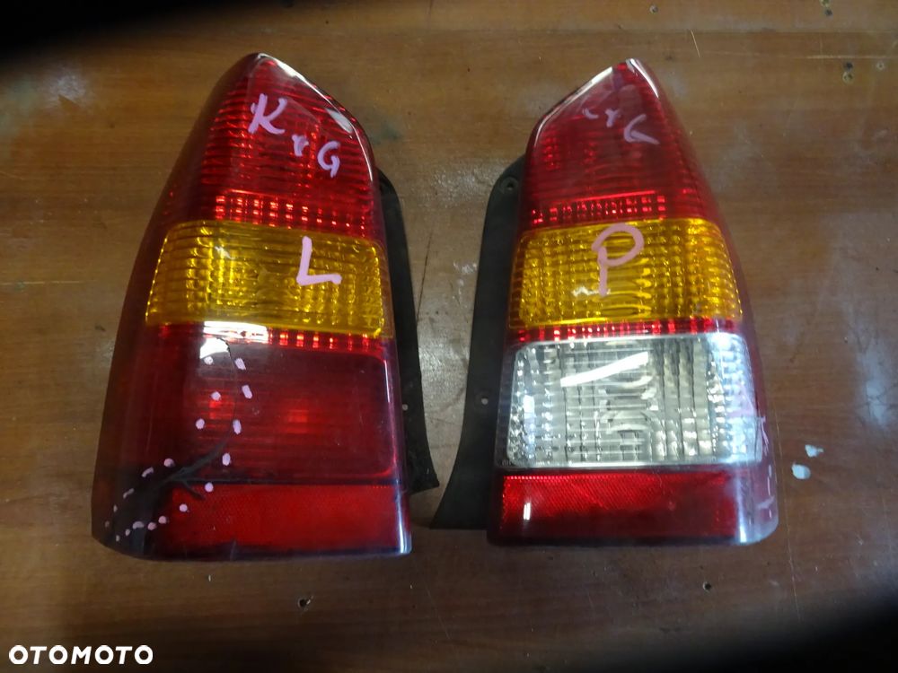 MAZDA TRIBUTE LAMPA TYL TYLNA LEWA TANIO STAN JAK NA FOTO NA ZAPCHAJ DZIURE