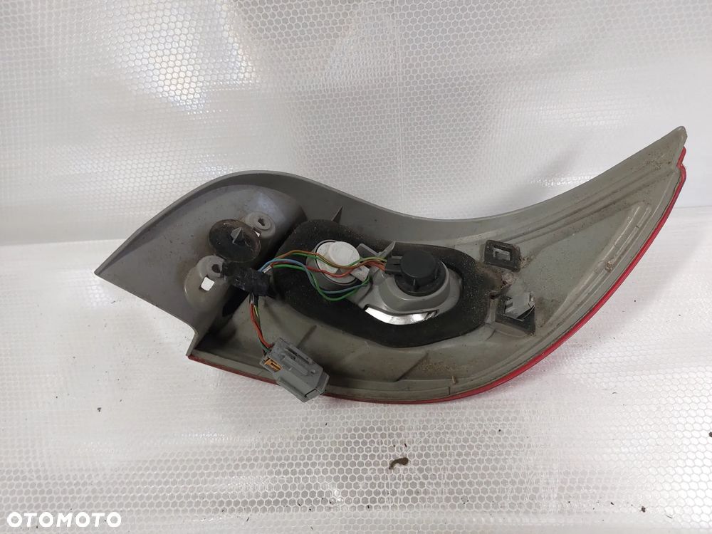.  LAMPA TYL TYLNA LEWA MITSUBISHI COLT Z30 CABRIO - 4