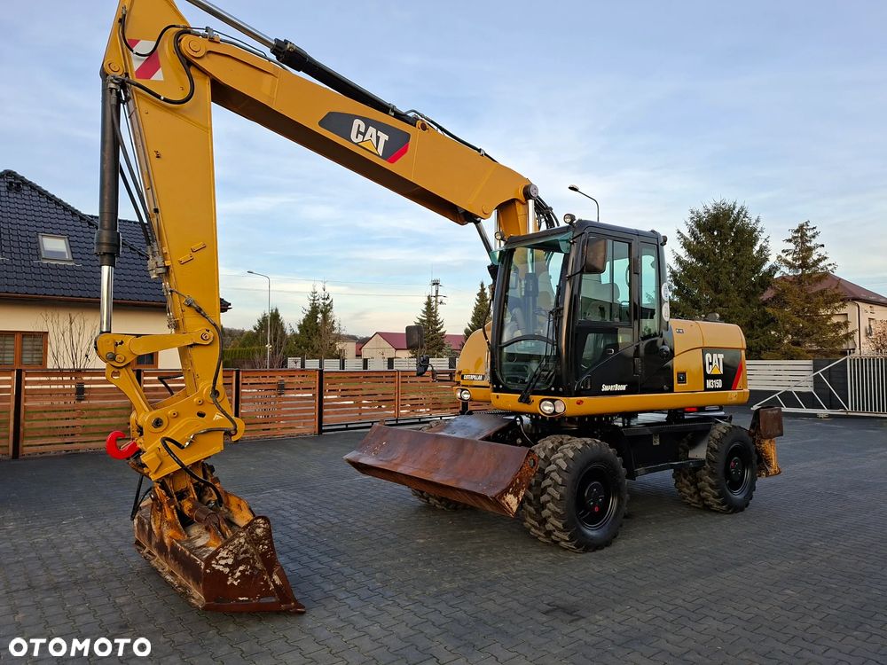 Caterpillar CAT M315D Rok 2011 - 2