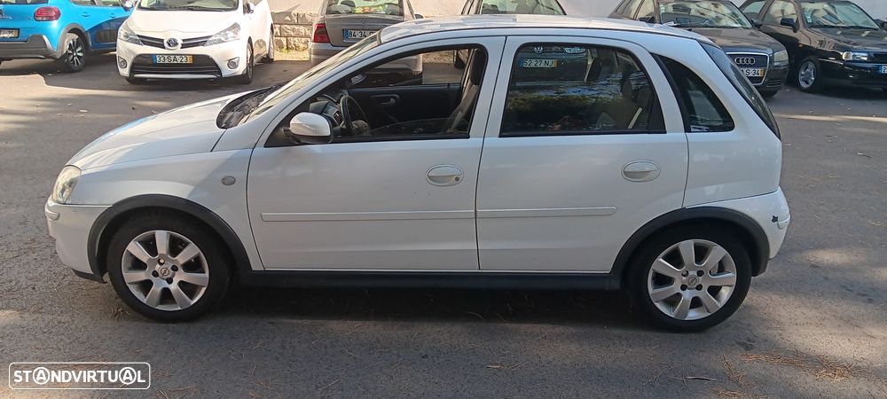 Opel Corsa 1.2 Twinport Enjoy - 1