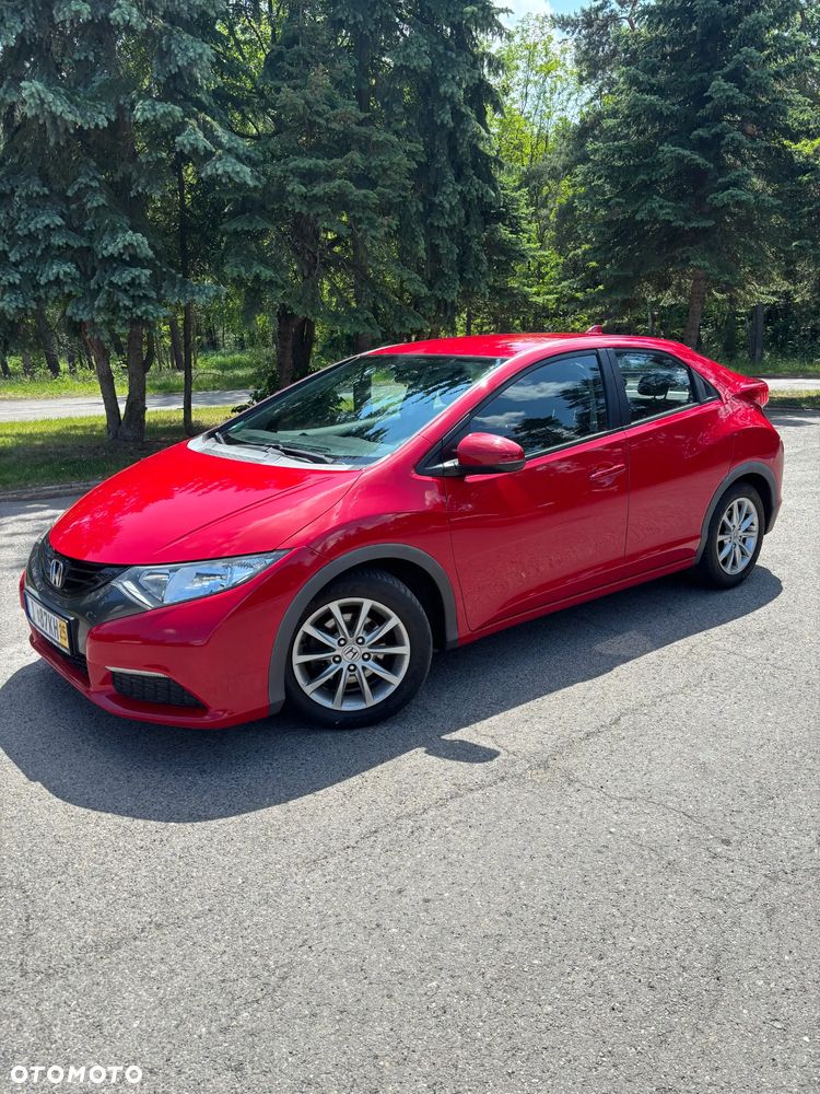 Honda Civic 1.4 i-VTEC Elegance - 1