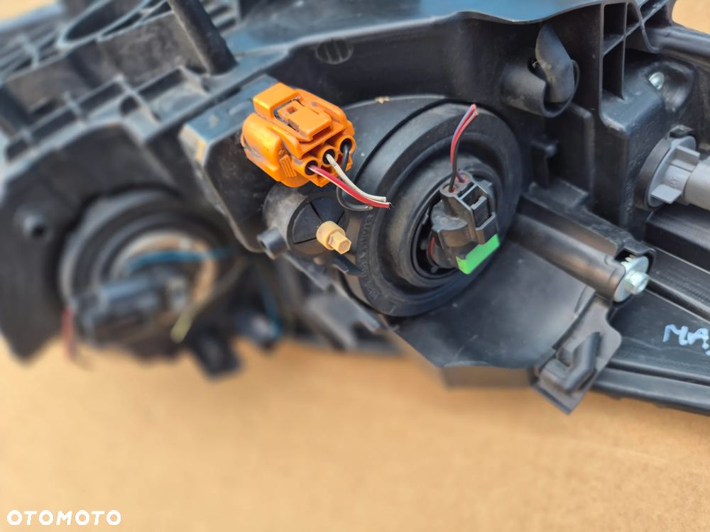 Mazda 5 II lampa lewa.OE.2010-2015. 100% - 9