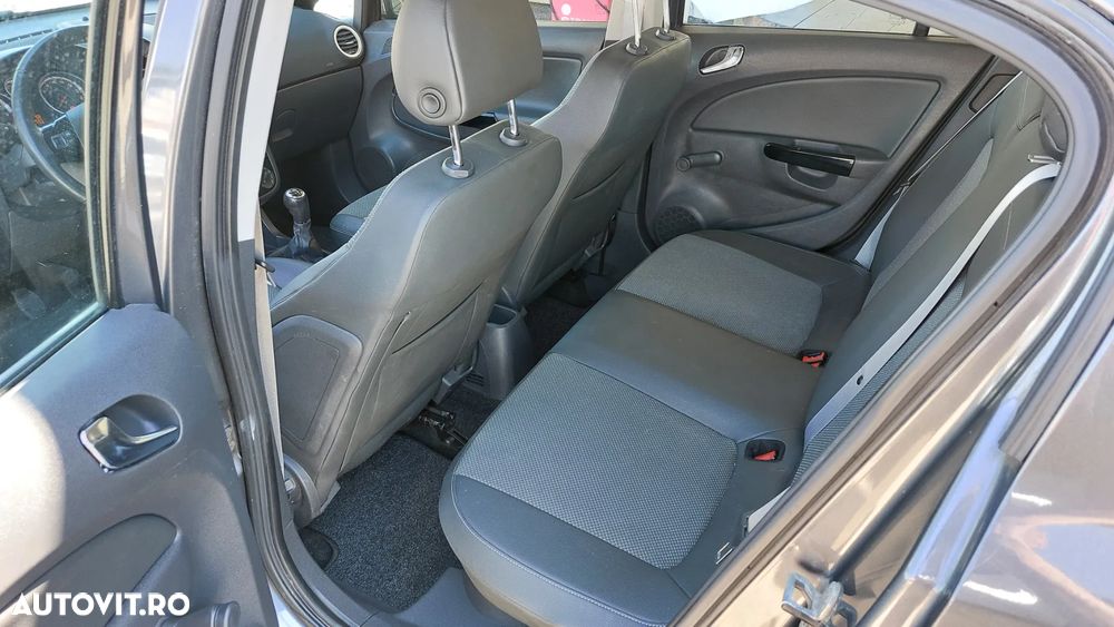 Opel Corsa 1.4i Cosmo - 12