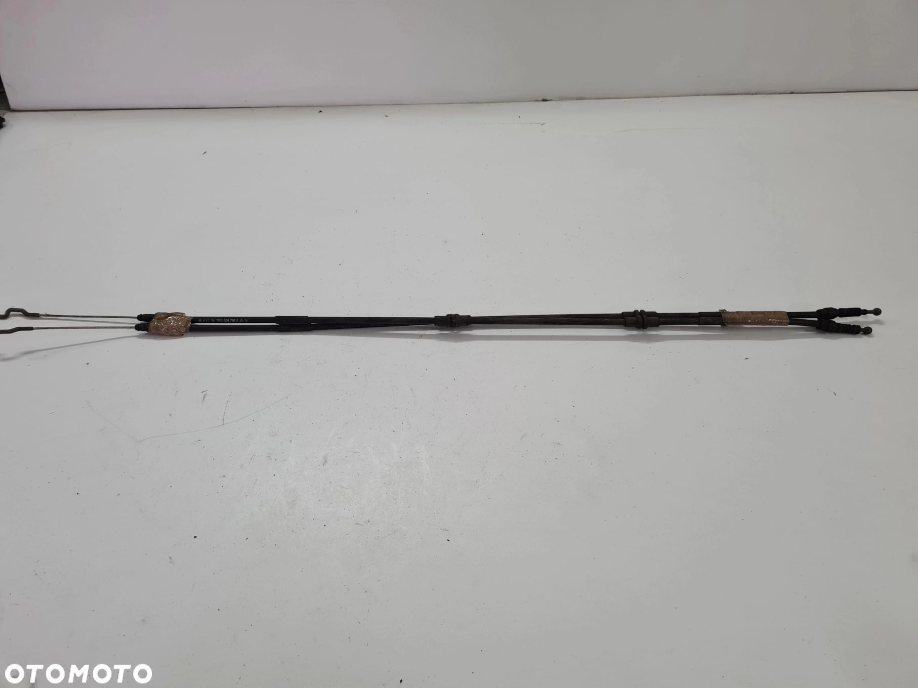 VW T5 linka cięgno hamulca ręcznego 7E0609701E - 1