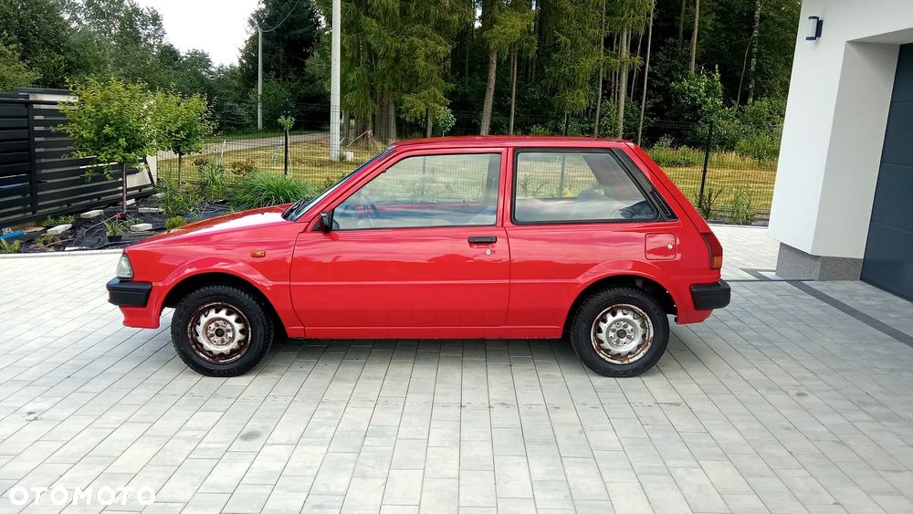Toyota Starlet 1.0 E - 4