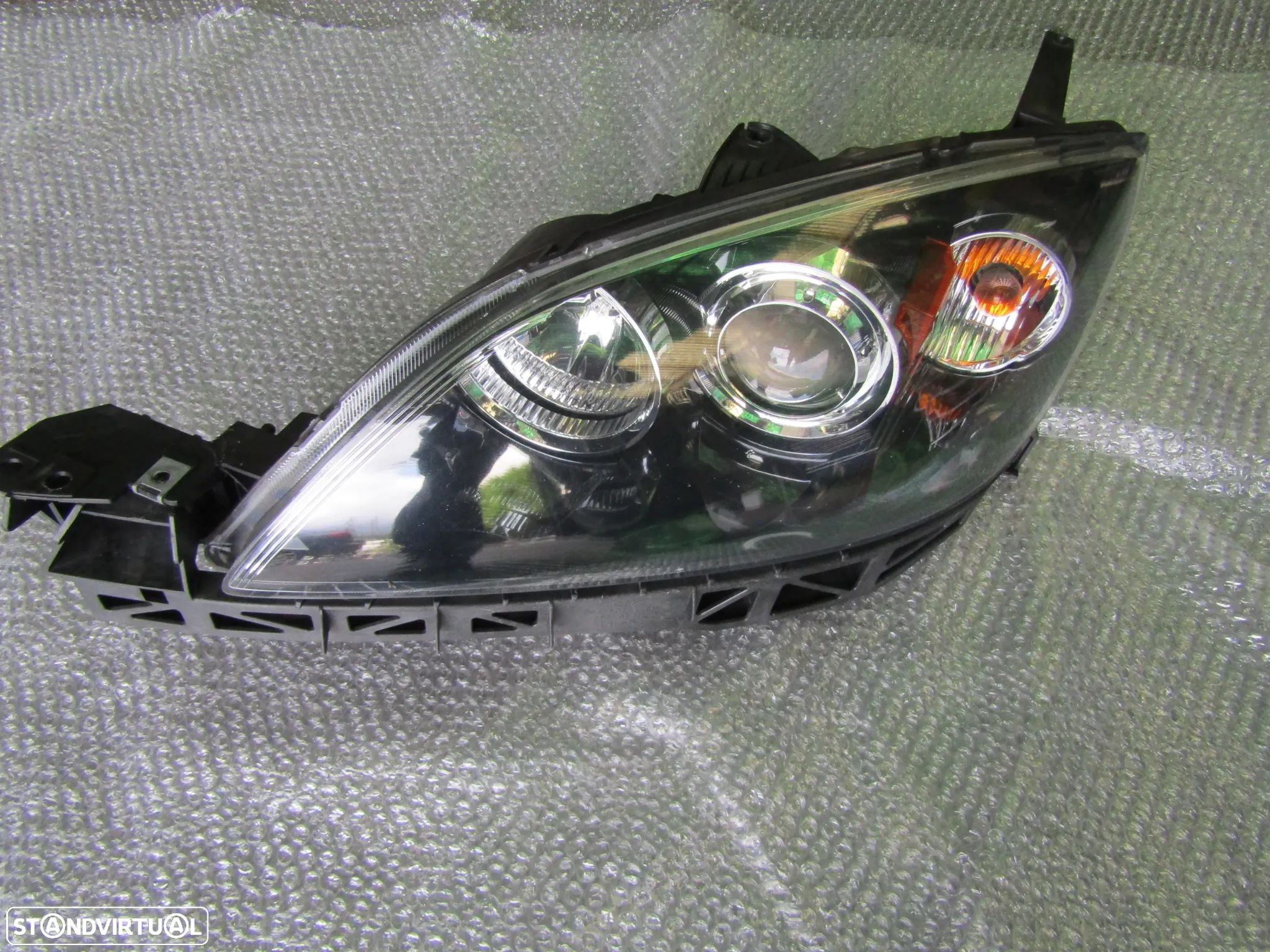 Farol esquerdo Mazda 3 ano 2006 a 2010(ver descrição) - 1