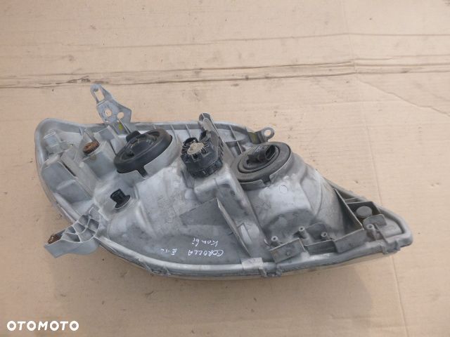 LAMPA LEWY PRZÓD LEWA PRZEDNIA TOYOTA COROLLA E12 01- - 16