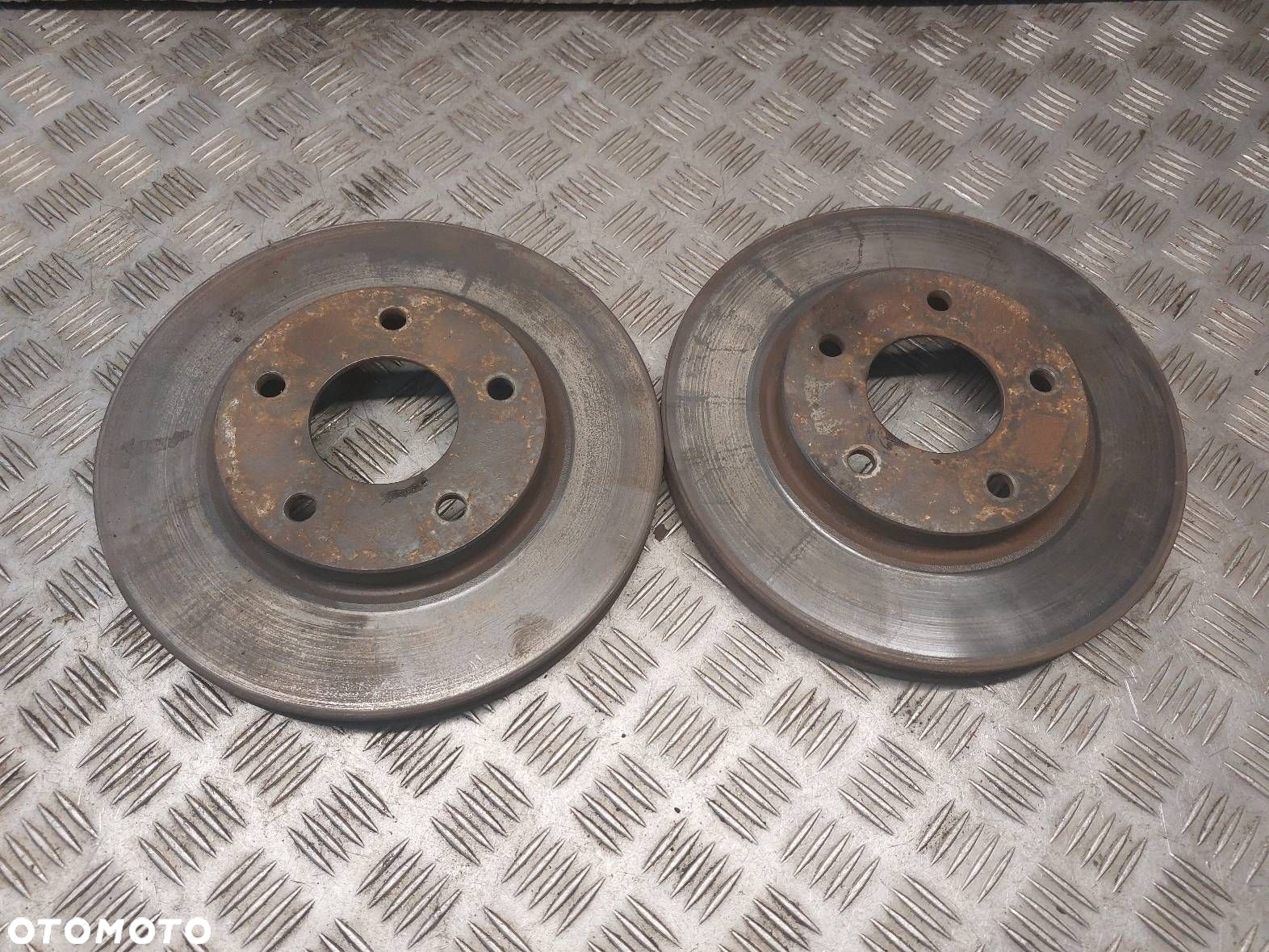 TARCZE HAMULCOWE PRZÓD + ZACISKI MITSUBISHI LANCER VIII - 8