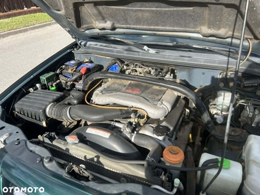 Suzuki Grand Vitara 2.5 V6 - 19