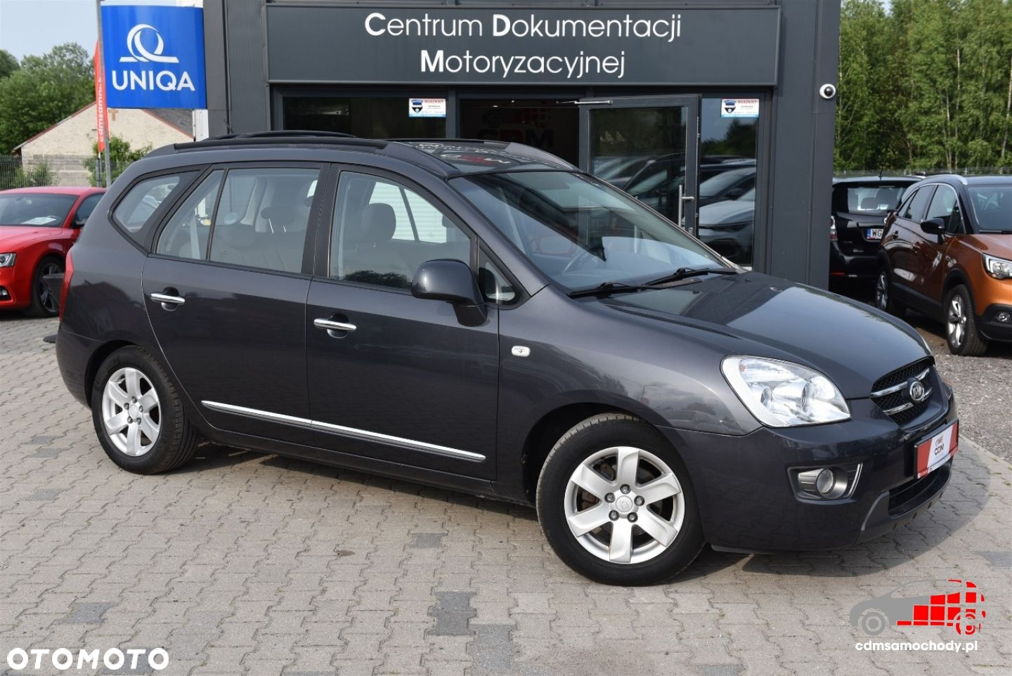 Kia Carens - 4