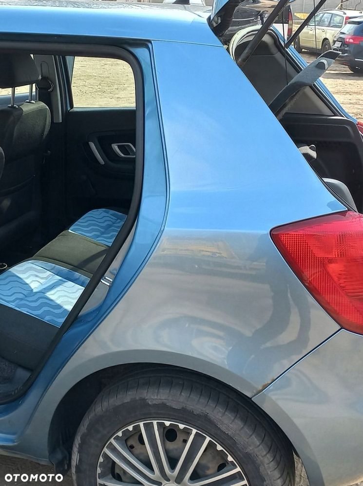 BŁOTNIK TYLNY LEWY SKODA FABIA II HB 9154