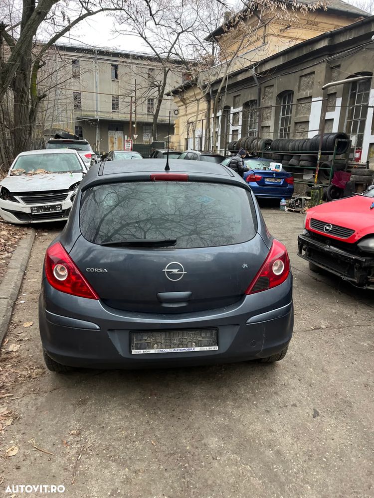 Dezmembrez Opel Corsa D coupe 2006 benzina gri inchis - 3
