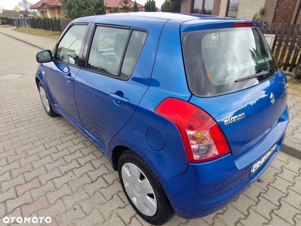 Suzuki Swift 1.3 Sakura - 39
